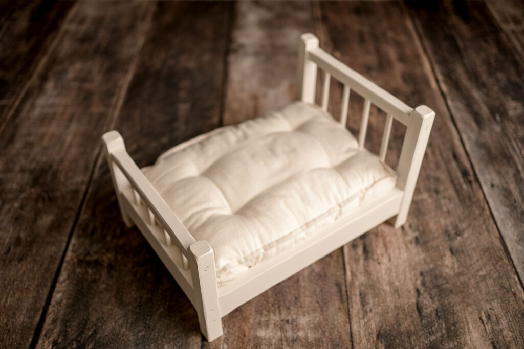 Small white bed prop used for Newborn Photography in Ellicott City, MD